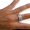 Ring aus Stahl mit Silberringen und Keramik