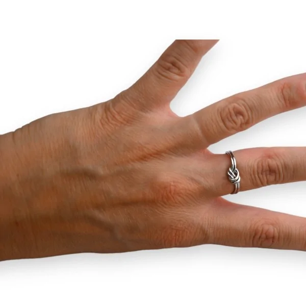 Silver knotted steel ring
