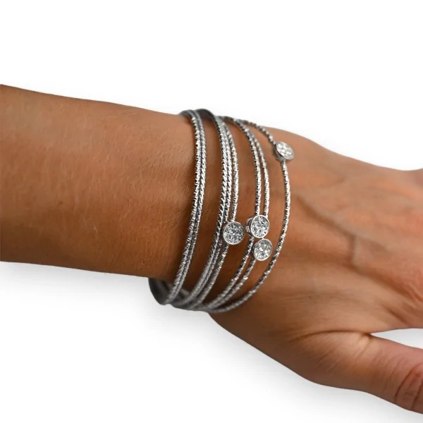 Silver rigid bracelet with 8 hammered rows
