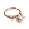 Bracelete rígido de charms em cobre rosado com árvore da vida