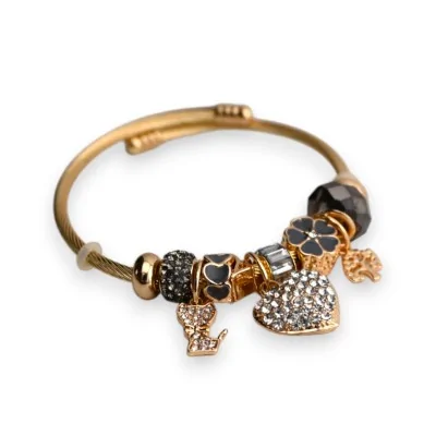 Pulsera rígida de dijes gris y dorada con corazón de estrás