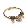 Bracciale rigido con charm grigio e dorato con cuore in strass