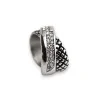 Silver steel ring with crossed design, rhinestones and checkerboard pattern | Trendy Fashion
