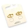 Pendientes de acero dorado con corazones entrelazados