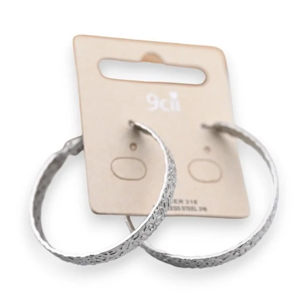 Silver leopard print steel hoop earring
