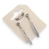 Silver-plated delicate dangling earrings with rhinestones