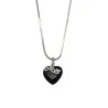 Silver-plated heart necklace with black stone and LOVE engraving