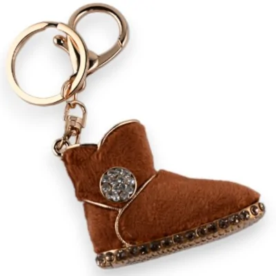 Goldener Schlüsselanhänger mit kamelbraunem Schuh