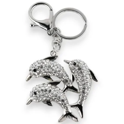 Chaveiro prateado com banco de golfinhos e strass