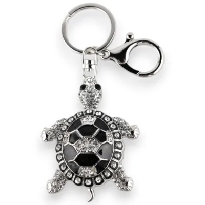 Silver keychain with black and white rhinestone turtle