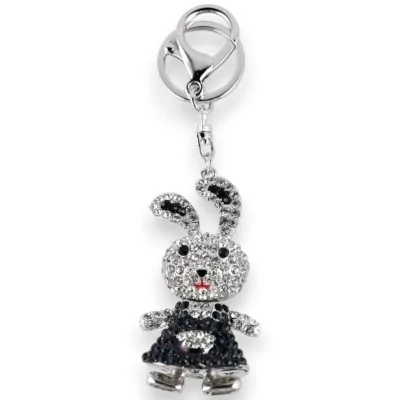 Silver keychain with small bunny in dark blue dress