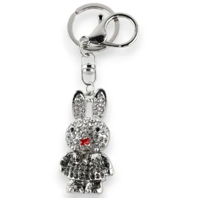 Silver keychain with little bunny in grey dress