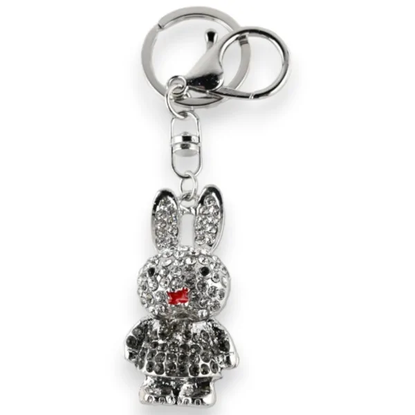 Chaveiro prateado com pequena coelhinha de vestido cinza