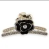 Pince à cheveux doré rose noire et strass