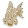 Goldene Haarspange mit Blume auf Stiel und Perle