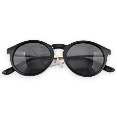 Gafas redondas negras y doradas