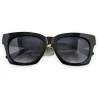 Black and gold rectangular glasses