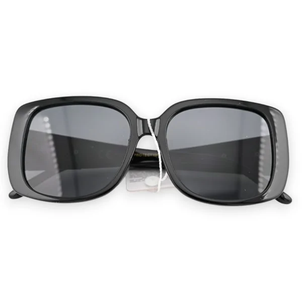 Gafas de gran tamaño negras con acabados dorados