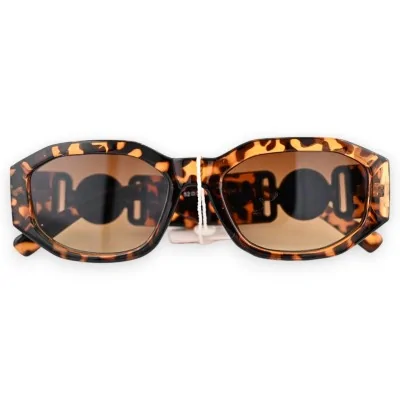 Rechteckige Brille in Braun mit Leopardenmuster, breite Bügel und goldene Schmuckelemente