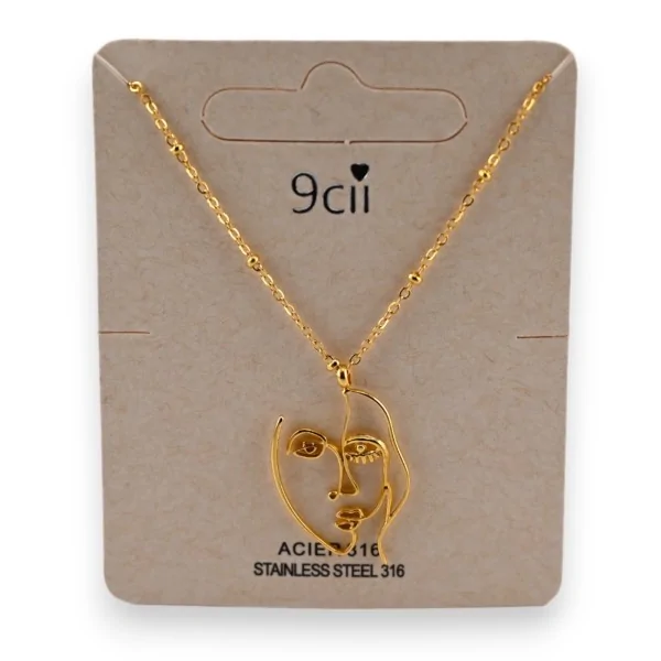 Collana in acciaio dorato con viso