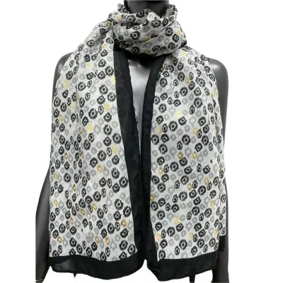 Ethnic scarf with gold details in black and white