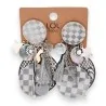 Clip-on fashion earrings with gray and white mother-of-pearl checkerboard pattern