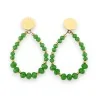 Pendientes de acero dorado con perlas verdes de Brasil