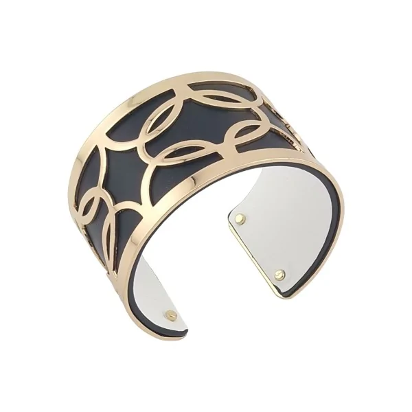 Brazalete acabado dorado de cuero sintético negro y blanco