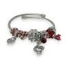 Silver and red rigid charm bracelet with treble clef