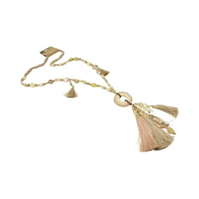 Long fantasy necklace in beige shades with round medallion, tassels and charms