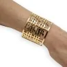 Goldenes Manschetten-Armband mit Musiknoten | Trendiger Musikschmuck