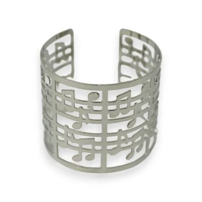 Silver cuff bracelet with musical notes