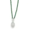 Fantasy necklace with green pearls and brushed silver medallion