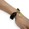 Pulsera negra de cadena gruesa de resina con medallón dorado