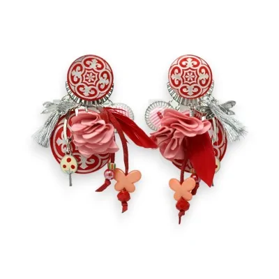 Clip-on earrings with red and white arabesque design