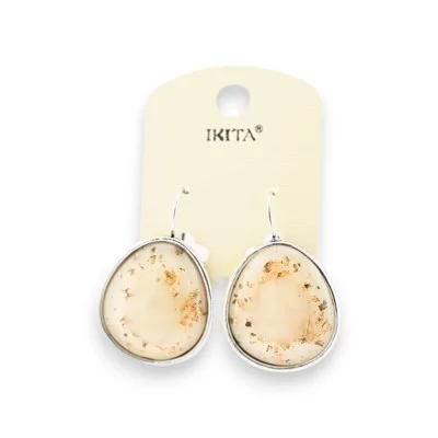 Pendientes de metal plateado con virutas de hojas doradas en color crudo marca Ikita