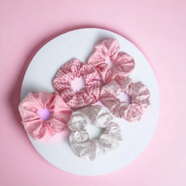 Juego de 5 coleteros estampados en rosa y blanco