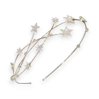Cerchietto stellato in metallo dorato e strass