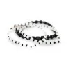 Set mit 3 elastischen Modeschmuck-Armbändern Ikita Schwarz und Weiß