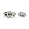 Geometrische Fantasiebrosche in Silber und Schwarz