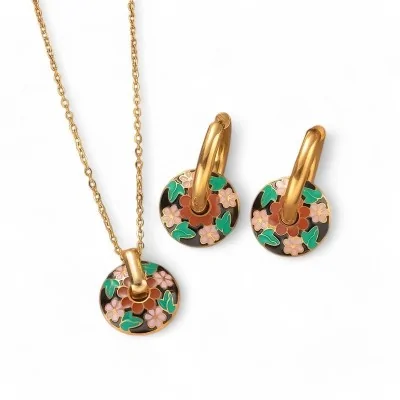 Parure bijoux Acier doré...