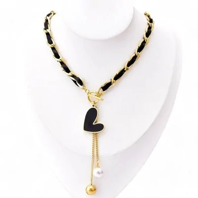 Collier acier doré cœur...