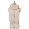 Asymmetrical beige knitted scarf with pom-poms