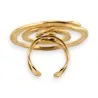 Anillo Espiral Dorado Ajustable | Joya de Diseño Contemporáneo en Acero
