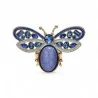 Pregadeira borboleta em esmalte azul com asas em azul real e branco pérola, cristais azuis facetados, corpo cabuchão oval lavand
