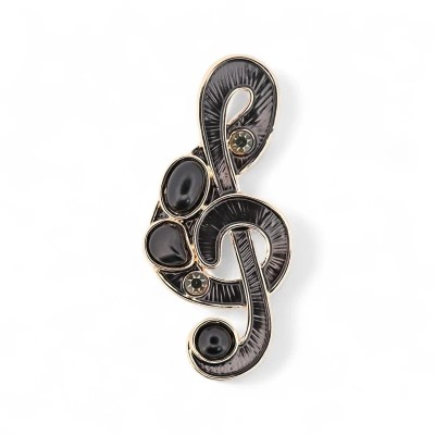 Black treble clef brooch front view, deep black guilloche enamel with radiating brush stripe texture, four polished black caboch