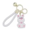 Porte-clés lapin blanc et rose avec lanière tressée et grelot