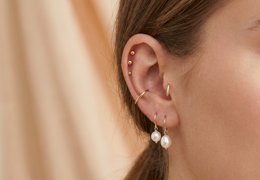 Guide des piercings d'oreille : helix, lobe, tragus, conch et daith